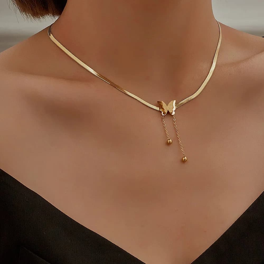 Collar de mariposa vintage con hoja dorada para mujer